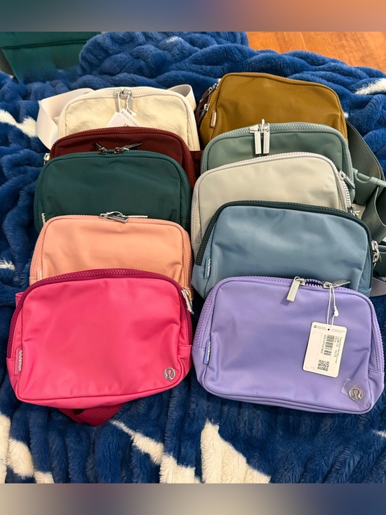 lululemon athletica Handbags - Lot of 10 Authentic Large Lululemon Belt bags.